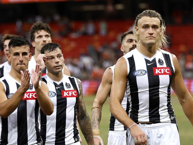 Collingwood's Nick Daicos and Darcy Moore leave the field during the AFL Opening Round match between the GWS Giants and Collingwood Magpies at Engie Stadium, Sydney on  March 9, 2024.  Photo by Phil Hillyard(Image Supplied for Editorial Use only - Phil Hillyard  **NO ON SALES** - Â©Phil Hillyard )