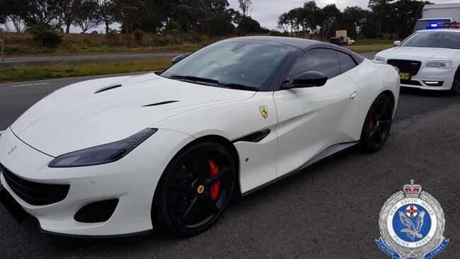 Police confiscated Brett Sutcliffe’s white Ferrari after he was caught driving it at 204km/hr on the Hume Highway at Goulburn in June. Picture: NSW Police`