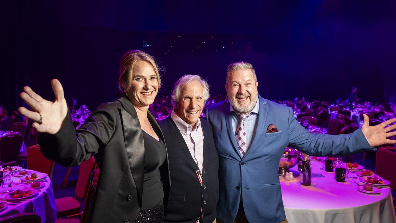 Henry Winkler with Toowoomba Hospital Foundation chief executive Alison Kennedy and Tilly’s Legends at their Game MC Lee Faulkner at the Empire Theatre, Saturday, February 10, 2024. Picture: Kevin Farmer