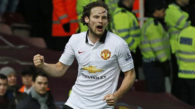 Manchester United’s Daley Blind celebrates after scoring during the English Premier League soccer match between West Ham United and Manchester United at the Boleyn Ground in London, Sunday, Feb. 8, 2015. (AP Photo/Alastair Grant)