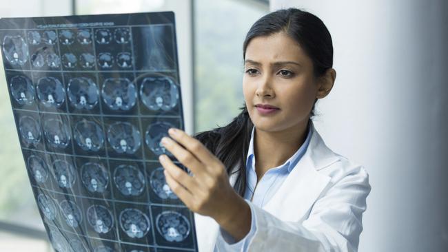 Generic photo in hospital - doctor looking at an xray (x-ray).  Picture: iStock