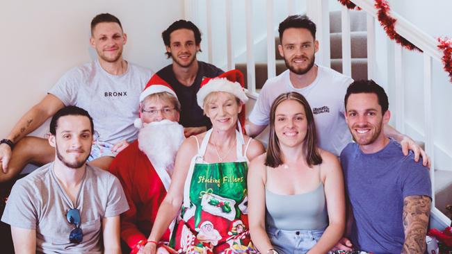 The Maggs family, siblings Tyrone, Jacob, Zachary, Olivia, Oscar and Callum (top right) with parents Anthony and Andrea.