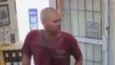 Police want to speak to this man who they believe may have some information about the alleged stealing of alcohol from a liquor store at Labrador. Picture: Queensland Police Service