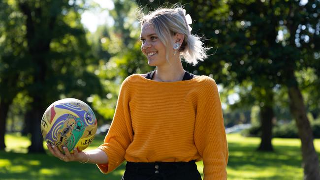 Gamilaroi artist Krystal Dallinger designed the league’s artwork this year, including on the match ball. Photo: Joanna Margiolis/Netball Australia