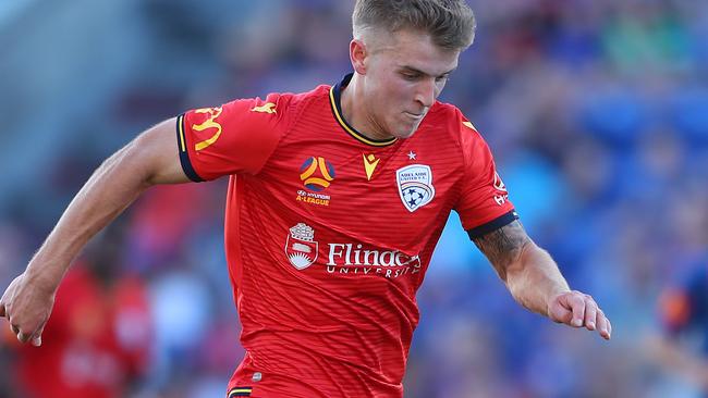 Adelaide United’s Riley McGree is expected to be called up for Australian under 23 national duty in November and January. McGree scored twice in the Reds 2-1 win over Newcastle Jets at McDonald Jones Stadium on Saturday. (Photo by Tony Feder/Getty Images)