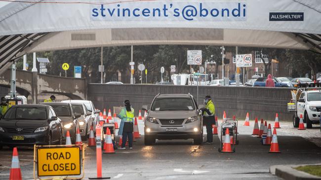 A small queue at the Bondi Beach Covid testing station on Saturday. Picture: Julian Andrews