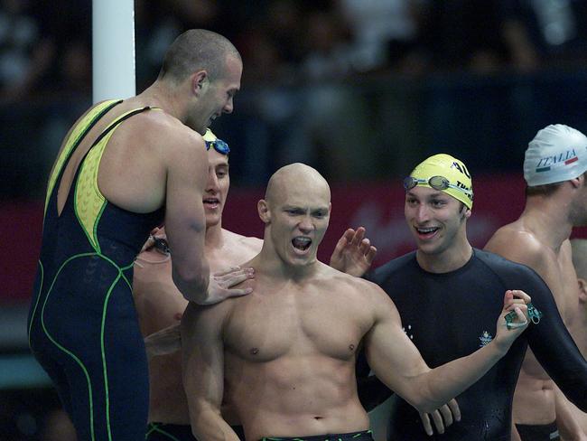 The Aussie swimmers celebrate their 4x100m freestyle title at the Sydney 2000 Olympics.