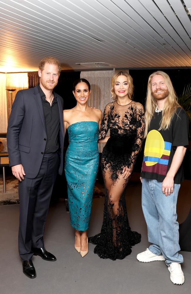 Harry and Meghan mingle with Rita Ora and Sam Ryder during the Invictus Games closing ceremony. Picture: Getty Images