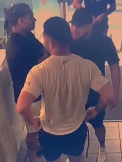 CCTV footage shows Lyzwa (left) and Ali Younes (right) in an animated discussion at a Westfield shopping centre last November.
