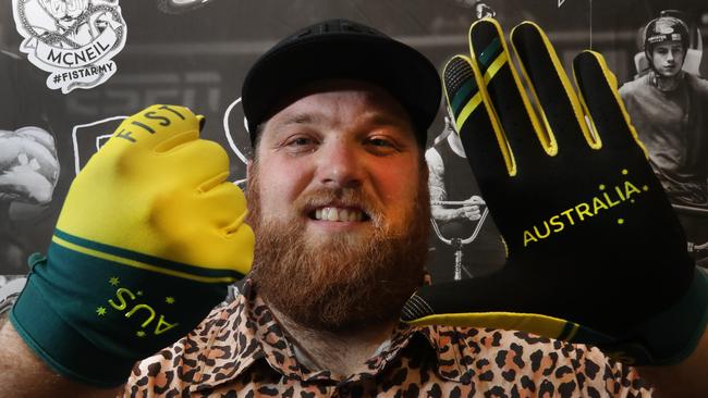 While Gold Coast athletes were winning gold in Tokyo in the BMX freestyle, Sam Moore, who owns a business based in Varsity Lakes called FIST, was proudly looking at their hands wearing his product. All the athletes on the podium were wearing gloves made by the Gold Coast business. Picture Glenn Hampson