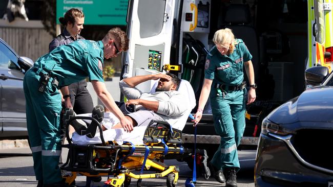 A driver is taken away in an ambulance after a car accident on Kensington Road, Norwood, in April. Picture: Kelly Barnes