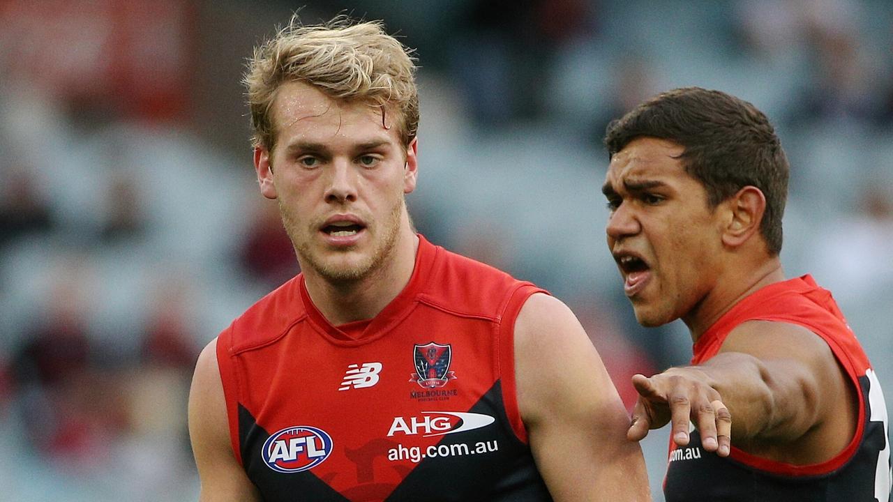 AFL- Melbourne v GWS at MCG, Melbourne. Neville Jetta yells at Jack Watts. 17th August 2014. Picture: Colleen Petch.