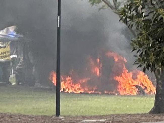 A fire has ignited at a major tent city at Musgrave Park, South Brisbane this morning. Emergency services were called to a reported fire at Musgrave Park, on the corner of Russell St and Cordelia St, just before 11.15am. On arrival, crews found a tent that was well engulfed by flames. Picture Reddit