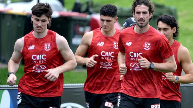 James Van Es, Anthony Caminiti, Anthony Caminiti, Max King, and Mitch Owens running laps at St Kilda training. Picture: Andrew Henshaw