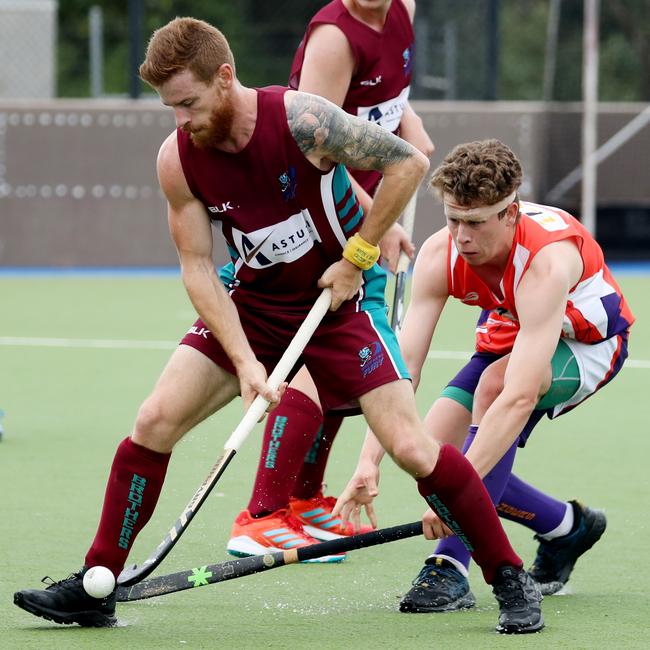 Cairns Hockey. Stingers v Brothers on Reef Turf. Brothers' Phillip Dumpleton and Stingers' Mitchel Barber. PICTURE: STEWART McLEAN