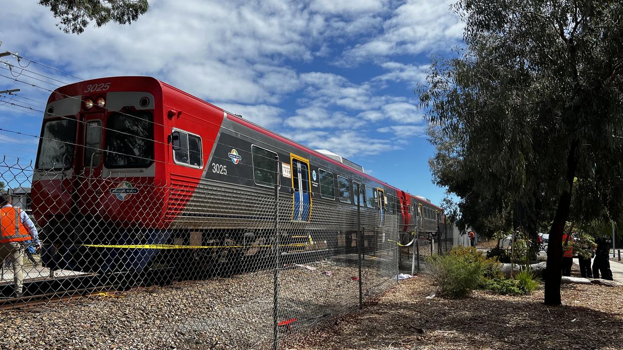 Emergency services are at the scene of a serious rail crash at Grange in Adelaide after a pedestrian was struck by a train near Terminus Street, suffering life-threatening injuries. Picture: NCA NewsWire / Emma Brasier