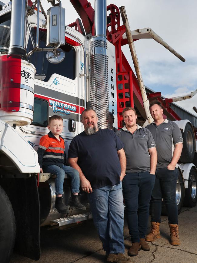 Adam Watson with grandson Campbell 4 and sons Jacab (Jacab) and Bradan (Bradan). Watson Haulage based in the Huon Valley truck company and family with a history of forest workers have been stiffed by the government awarding a contract to a Victorian firm. Picture: Nikki Davis-Jones