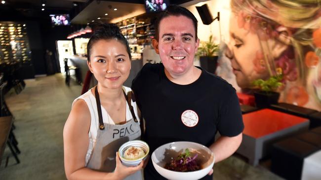 Peak Wine Bar owner Colin Cameron (right) and his wife Mo Qin (left).