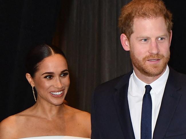 (FILES) Prince Harry, Duke of Sussex, and Meghan, Duchess of Sussex, arrive at the 2022 Robert F. Kennedy Human Rights Ripple of Hope Award Gala at the Hilton Midtown in New York City on December 6, 2022. Prince Harry and wife Meghan Markle were involved in a "near catastrophic car chase" involving paparazzi in New York late on May 16, 2023, a spokesperson for the couple said May 17. "This relentless pursuit, lasting over two hours, resulted in multiple near collisions involving other drivers on the road, pedestrians and two NYPD officers," the spokesperson added. (Photo by ANGELA WEISS / AFP)