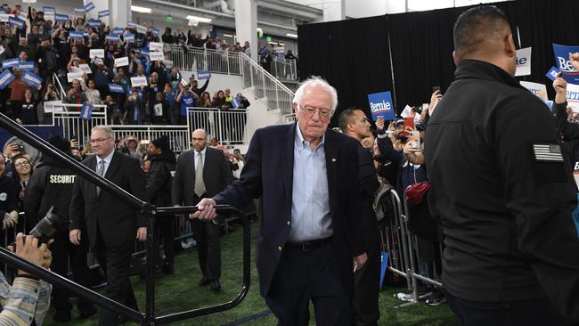 Bernie Sanders takes to the stage to speaks at a campaign rally in Springfield on Saturday.