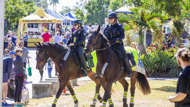 The Queensland Police Mounted Unit patrolling New Farm Park today. Picture: Richard Walker