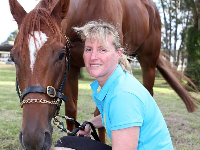 Three Rondavels has survived three life threatening injuries. He races at Doomben tomorrow. Photo of the horse with trainer Melissa Leitch.Pic by Richard Gosling