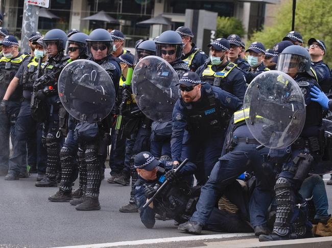 Victoria Police has 1000 officer vacancies, while close to 700 more are off on WorkCover. Picture: Luis Enrique Ascui