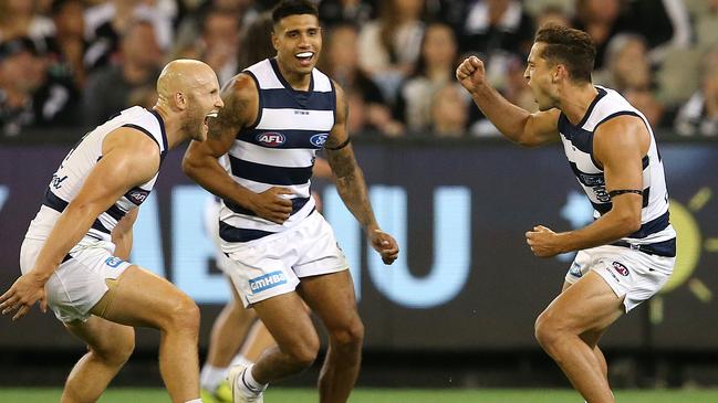 Luke Dahlhaus celebrates a goal with Gary Ablett and Tim Kelly. Picture: Michael Klein.