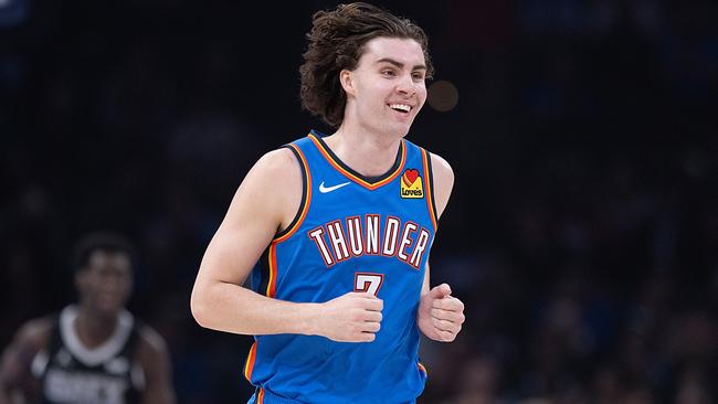 OKLAHOMA CITY, OKLAHOMA - APRIL 10: Josh Giddey #3 of the Oklahoma City Thunder smiles as he runs up court during the first half against the San Antonio Spurs at Paycom Center on April 10, 2024 in Oklahoma City, Oklahoma. NOTE TO USER: User expressly acknowledges and agrees that, by downloading and or using this Photograph, user is consenting to the terms and conditions of the Getty Images License Agreement. (Photo by Joshua Gateley/Getty Images)