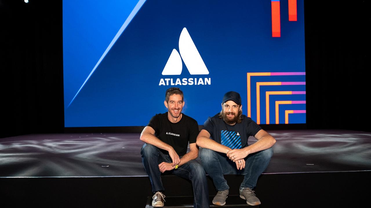 Atlassian co-founders Scott Farquhar and Mike Cannon-Brookes lose $1.6 billion in hours when the shares in their Atlassian company fall 8 per cent.