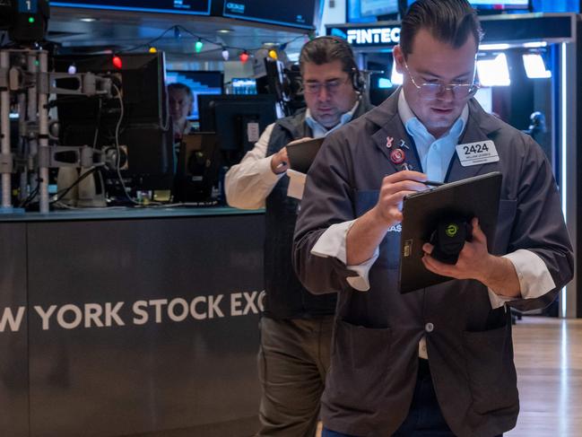 NEW YORK, NEW YORK - JANUARY 02: Traders work on the floor of the New York Stock Exchange (NYSE) on the first day of trading of the new year on January 02, 2025 in New York City. The Dow was up nearly 200 points in morning trading.   Spencer Platt/Getty Images/AFP (Photo by SPENCER PLATT / GETTY IMAGES NORTH AMERICA / Getty Images via AFP)