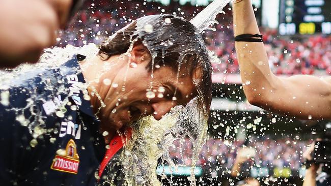 Luke Beveridge cops a Gatorade shower after the Dogs’ inspiring premiership win. Picture: Getty Images