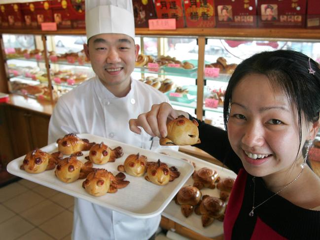 Siblings Jeff and Rowena Thai of the A One Cake Shop with moon cakes for Moon Festival at Cabramatta.