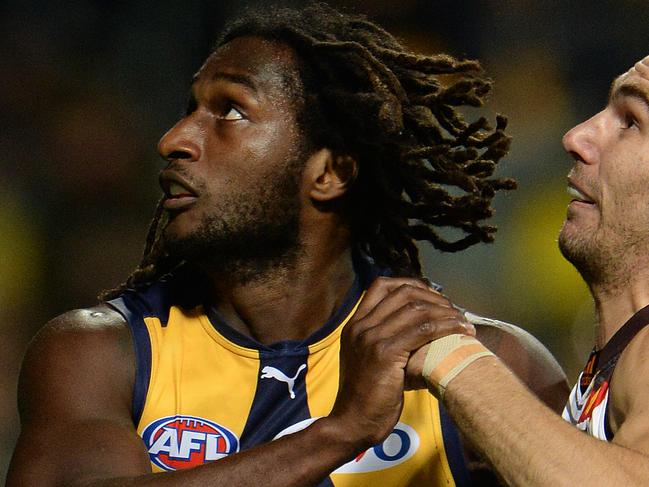 ***CORRECTION*** SPORT - AFL, West Coast Eagles vs Hawthorn Hawks at Subiaco Oval, Perth. Photo by Daniel Wilkins. PICTURED- West Coast's Nic Naitanui competes with Hawthorn's Jonathon Ceglar