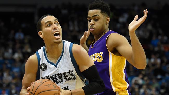 D'Angelo Russell of the Los Angeles Lakers defends against Kevin Martin of the Minnesota Timberwolves during the fourth quarter.