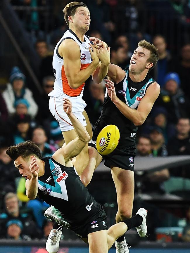 Giants forward Toby Greene fumbles a mark over Karl Amon. Picture: Getty Images