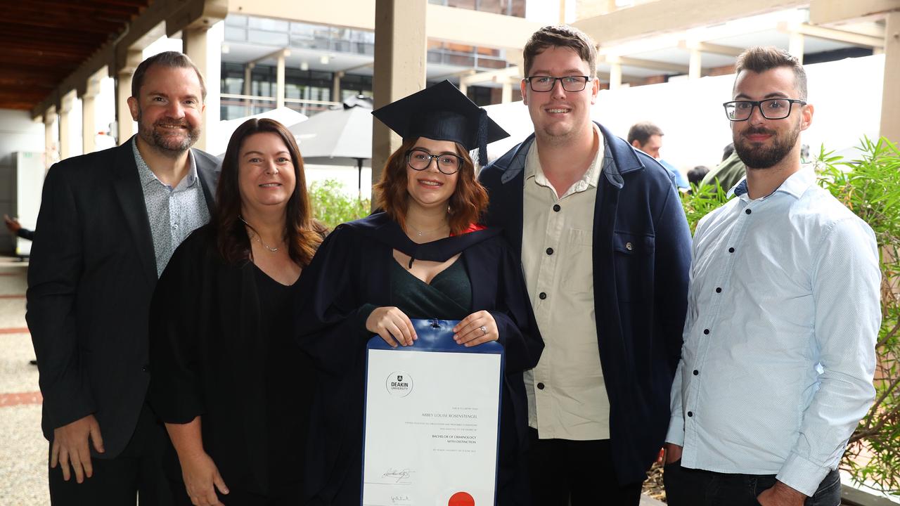 Deakin graduate Abbey Rosenstengel, with dad Brad and mum Sheryl, husband Luke and brother Matthew. Picture: Alison Wynd