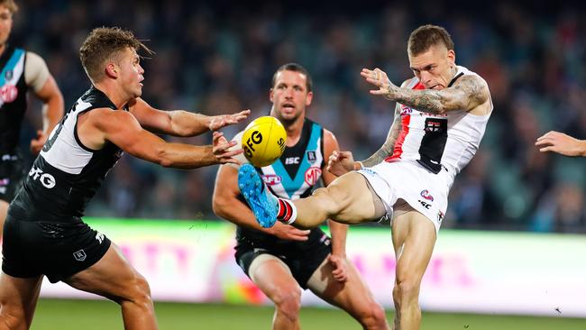 ADELAIDE, AUSTRALIA – JULY 25: Matthew Parker of the Saints kicks the ball during the round 8 AFL match between Port Adelaide Power and the St Kilda Saints at Adelaide Oval on July 25, 2020 in Adelaide, Australia. (Photo by Daniel Kalisz/Getty Images)