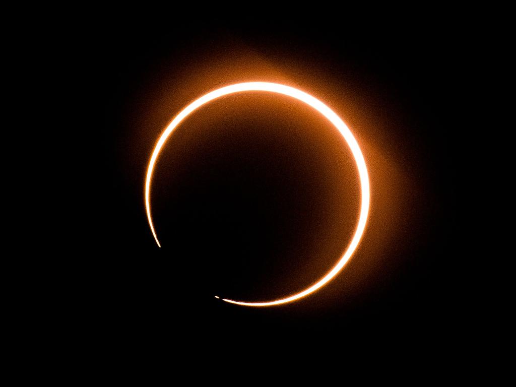 The moon moves in front of the sun in a rare "ring of fire" solar eclipse as seen from Tanjung Piai, Malaysia. Picture: AFP