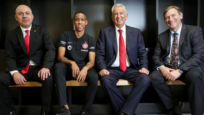 (l-r) Wanderers CEO, John Tsatimas, Wanderers star Keanu Baccus, Wanderers chairman Paul Lederer, and Blacktown mayor, Stephen Bali, inside the men's dressing sheds at the new training facility.