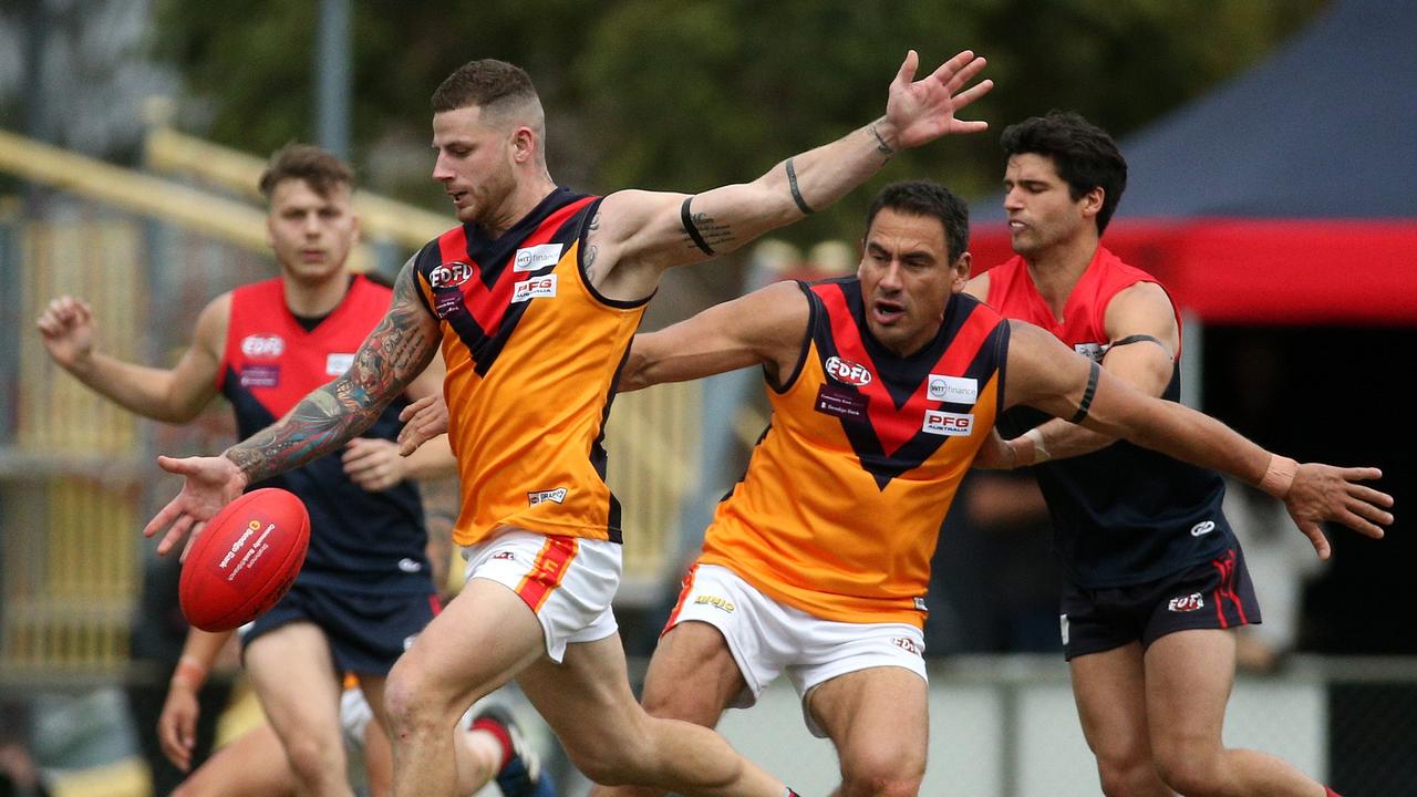 Essendon District: Victor Micallef of East Keilor kicks the wrong way. Picture: Hamish Blair