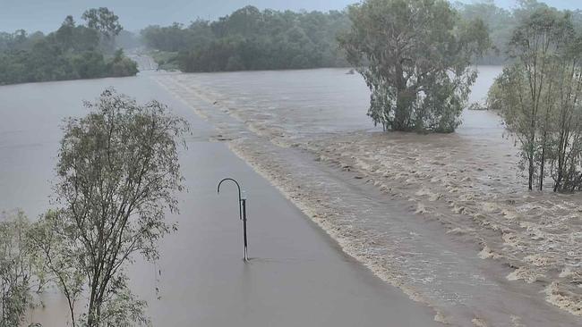 Gulf Development Road in Far North Queensland is one of dozens of roads in the region cut off due to swelling rivers and flash flooding. Picture: TMRQld