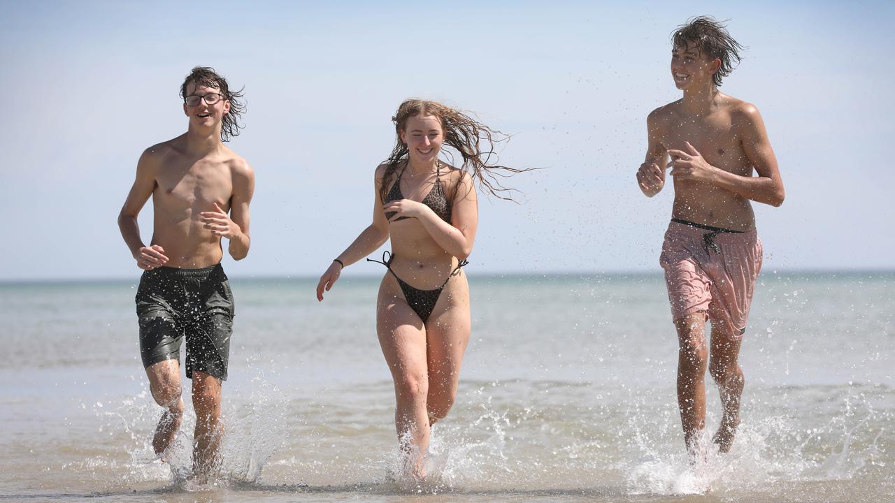 Max Pinfield, Charlotte Eley, and William Poprawski at Semaphore. Picture: NCA NewsWire / Dean Martin