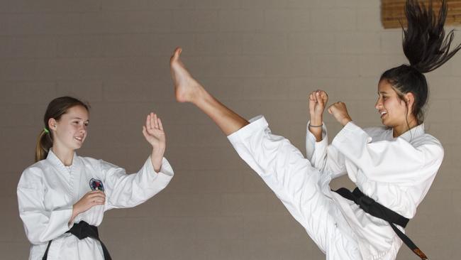 Sasha Lewis and Nina Von-Huben at their Brookvale dojo. Both are heading to the Australian Martial Arts titles.