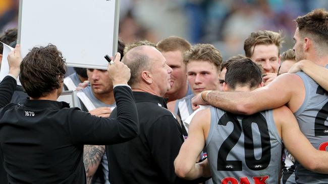 Port Adelaide coach Ken Hinkley talks to his players during the Round 13 AFL match against the Fremantle Dockers. Picture: AAP Image/Richard Wainwright