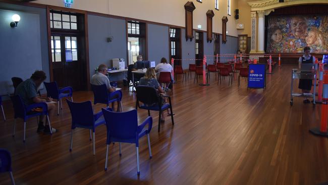 VACCINE HUB: Patients wait to receive their COVID vaccination at the Maryborough City Hall. Photo: Stuart Fast