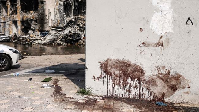 Blood stains a wall at an Israeli police station in Sderot after it was damaged during battles to dislodge Hamas militants. Picture: AFP