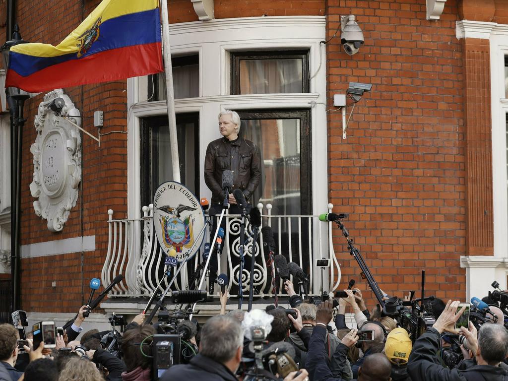 Assange speaks to the media from the balcony of the Ecuadorean embassy. Picture: Matt Dunham 