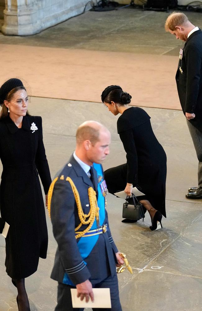 Kate, Duchess of Kent, Prince William, Prince of Wales, Meghan, Duchess of Sussex and Prince Harry, pay their respects inside Westminster Hall. Picture: AFP.