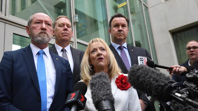 Chief government whip Nola Marino speaks to the media to declare the result of the leadership spill at Parliament House in Canberra. (AAP Image/Lukas Coch)